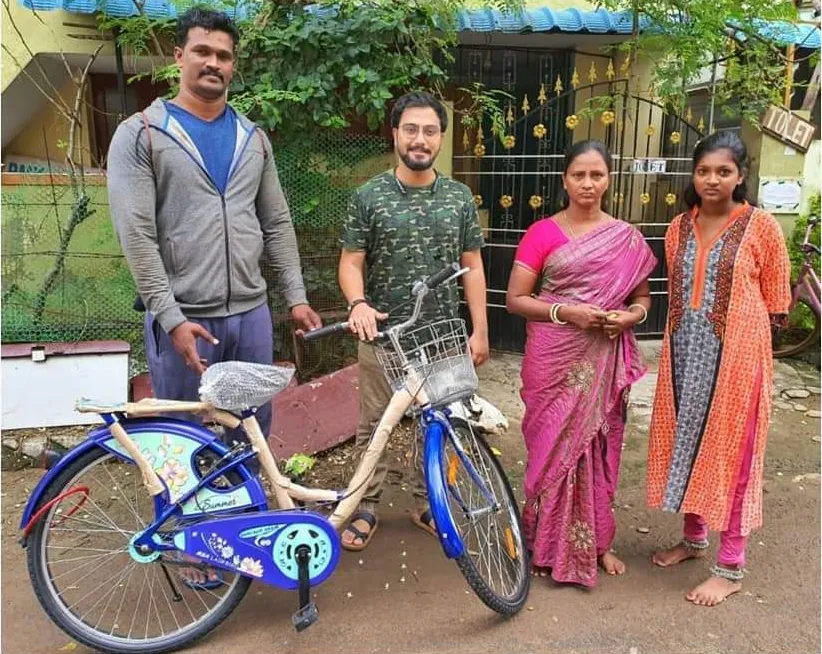 Tamiz Mozhi, student of class 8, is daughter of Sangeetha, a single parent who works in Chennai Corporation. She needed a bicycle, which was provided through funds generated from recycling. Pic: Walk for Plastic 30stades