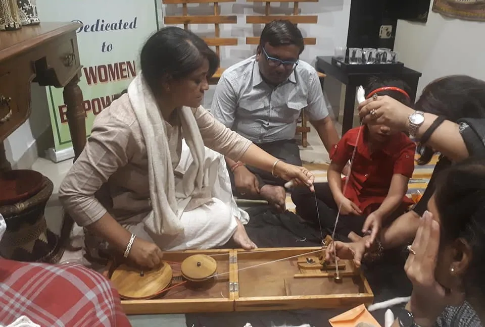 Rubi Rakshit at a charka workshop in Kolkata. She is using peti charka, which was used by Mahatma Gandhi in jail during the freedom struggle. Pic: Facebook/mggssrubirakshit 30STADES