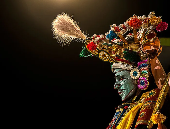 The artists wear a large headdress. Pic: Flickr 30stades