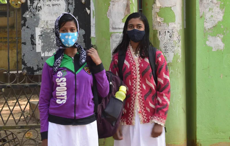 Students Supreeti Ghosh (L) and Chaiti Ghosh in front of the school entrance. Pic: Partho Burman 30stades