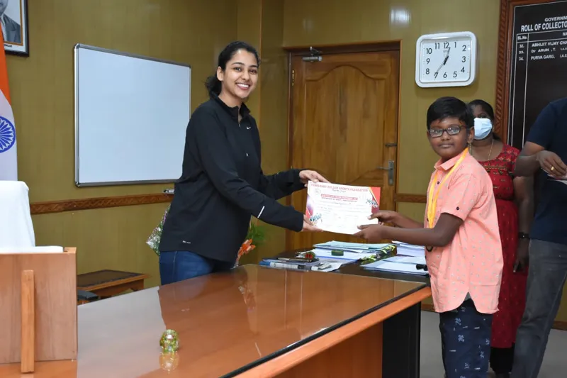 Sarantejaswi won two medals in the inter-district skating roll ball group event. Here, receiving the certificate from the then Puducherry collector Purva Garg. Pic: Bridges Vidyalaya 30stades