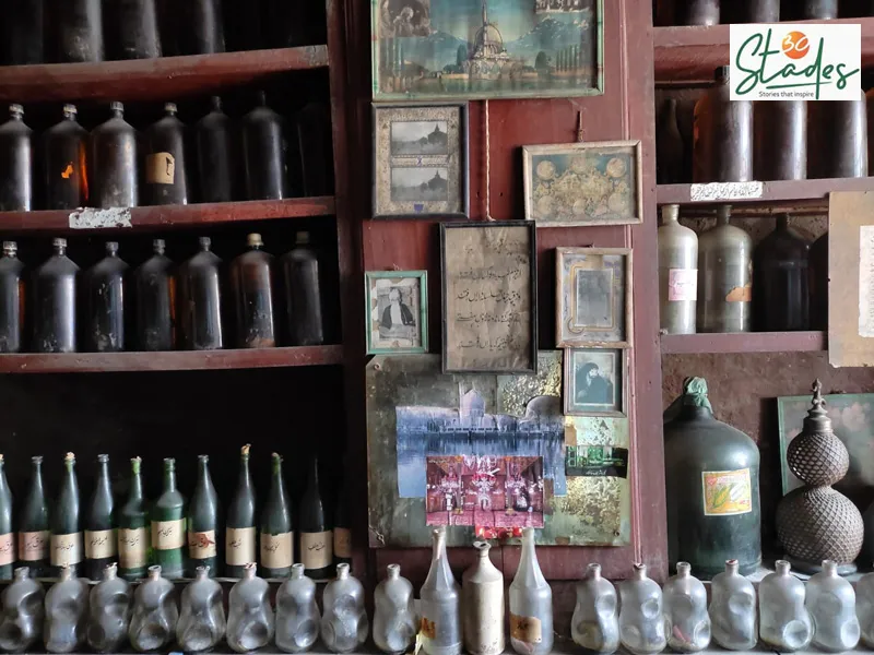 Antique jars are a reminder of the bygone era. The shop's walls also have Persian couplets and photos of saints. Pic: Parsa Mahjoob