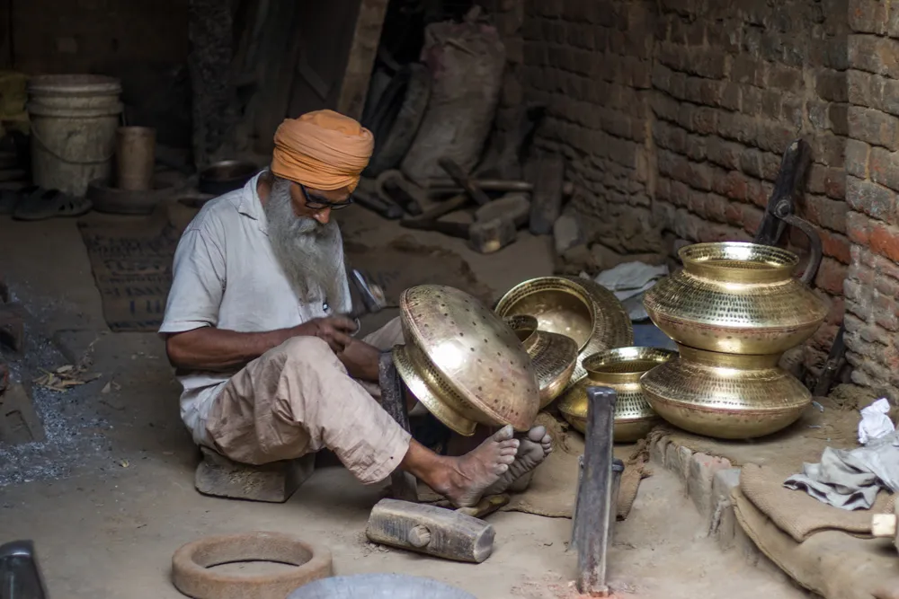 Thatheras handcraft brass, copper and bronze utensils. About 100 years back, 500 families were engaged in this craft in Jagdiala Guru. Pic: P-TAL
