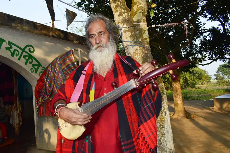 Mansur Fakir preaches the message of equality & humanity only with his dotara and Baul songs. Pic: Partho Burman 30 stades