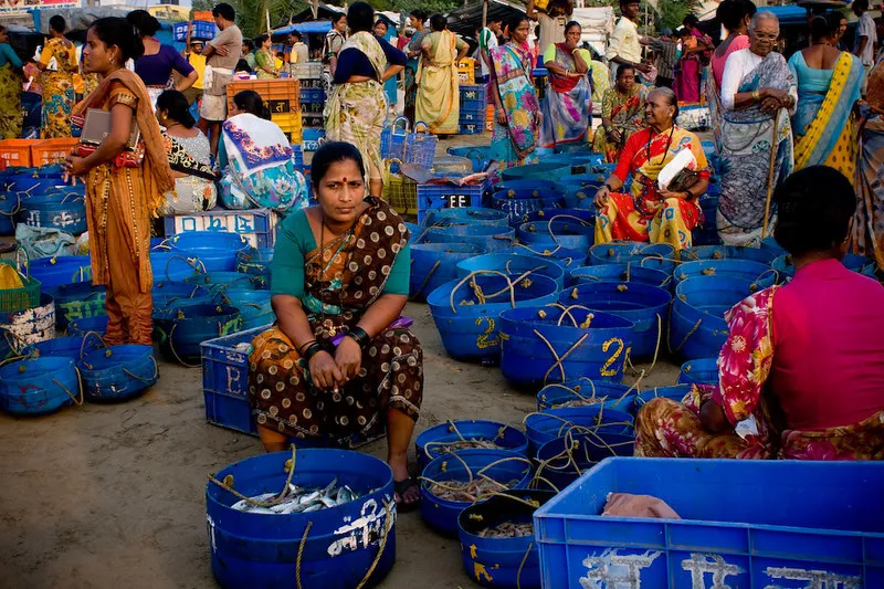 Koli women with fishes at a Mumbai fish market. Pic: Flcikr