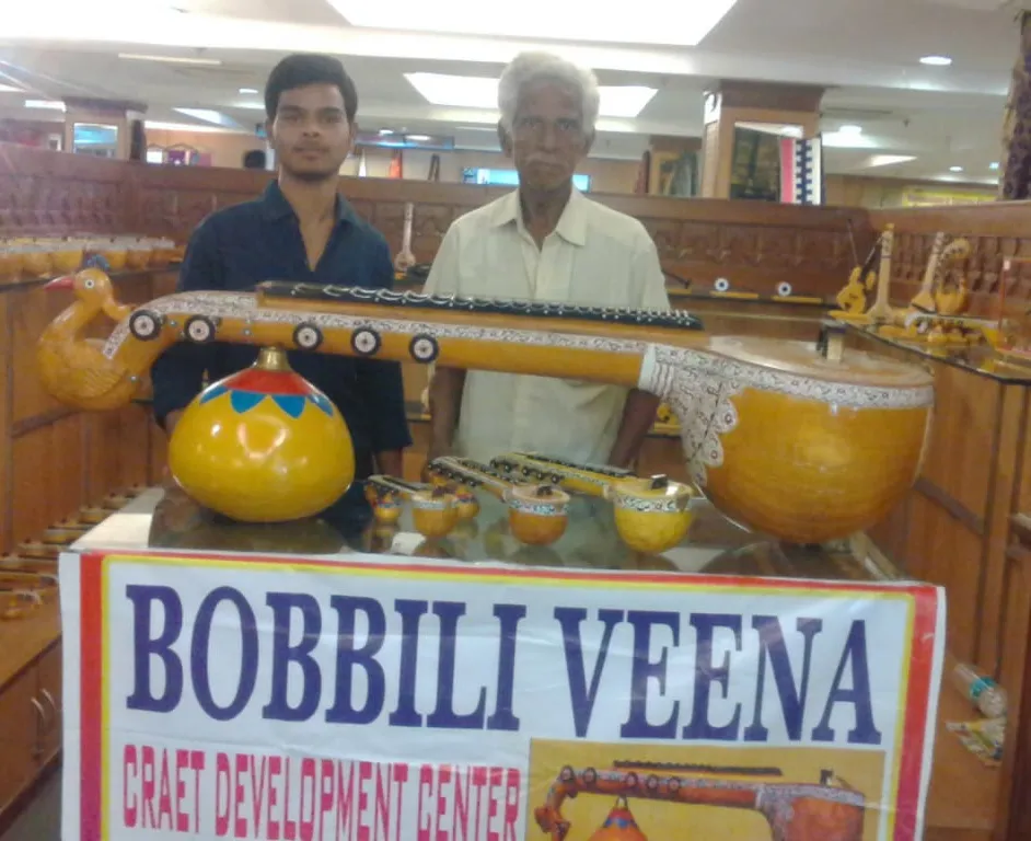 Award-winning Bobbili veena maker Sarvasiddi Atchyuta Narayana (right) with his grandson S Raj Sekhar, who is the fifth generation to practice the craft. Bobbili veena in various sizes displayed above. Pic: through Raj Sekhar