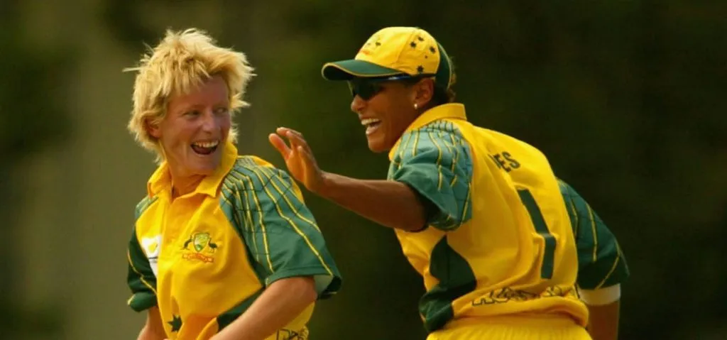 Cathryn Fitzpatrick celebrates a wicket with Melanie Jones. © Getty Images