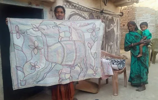 Learning to do their mural art on paper helps the women get many art commissions. Pic: Justin Imam  30stades