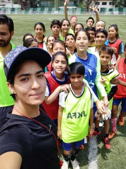 Nadia Nighat with football students in Srinagar