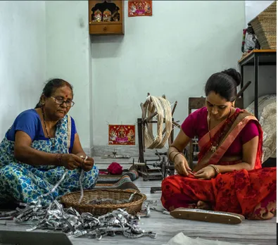 Women working with paper strips to make yarn for weaving. Pic: Sutrakaar 30stades