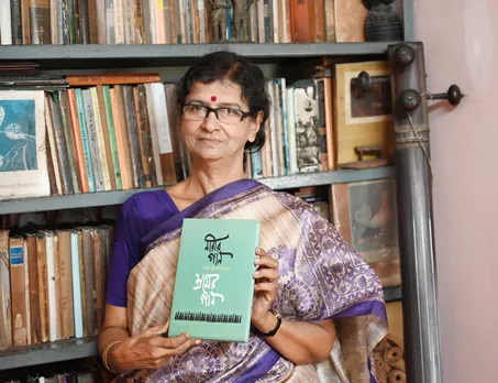Chandra Mukhopadhyay with her book Narir Gaan Shromer Gaan. There are 400 women's songs in this first volume. Pic: Partho Burman 30stades