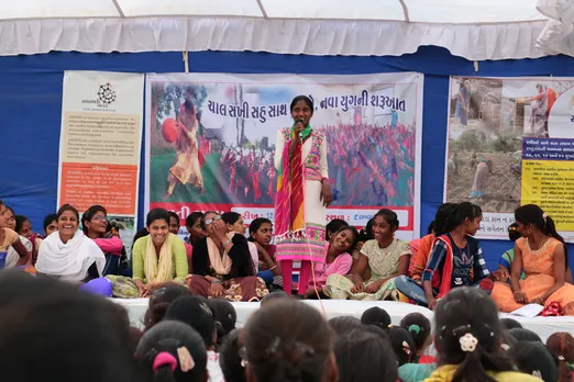 Young women speak up at a conference. Pic: ANANDI 30STADES