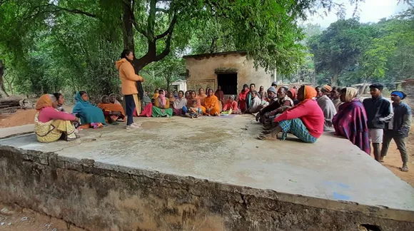 Yuva Compass member counselling the youth at Gram Sabha in the presence of locals. Pic: Udyogini 30stades