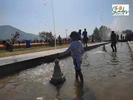 A child enjoying the cool water in Tulip Garden. Pic: Parsa Mahjoob 30stades