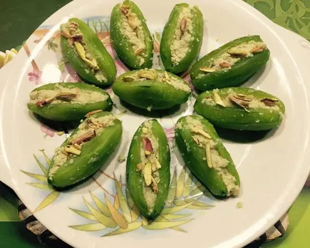 Bihar's famous parwal mithai - pointed gourd cooked in sugar syrup and stuffed with dry fruits and mawa (khoya).  