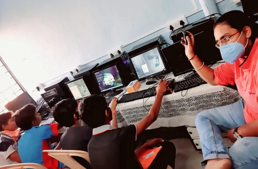 A senior volunteer taking computer class at Abha Kunj. Pic: through Abha Kunj