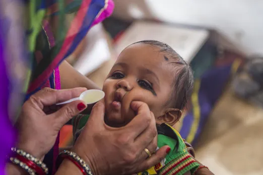 A community health worker giving polio vaccine.  India was declared polio-free in January 2014. Pic: Flickr