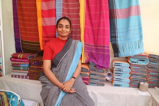 Dr Hemalatha Jain with Karnataka's hand woven sarees she is reviving. Pic: Punarjeevana 30stades
