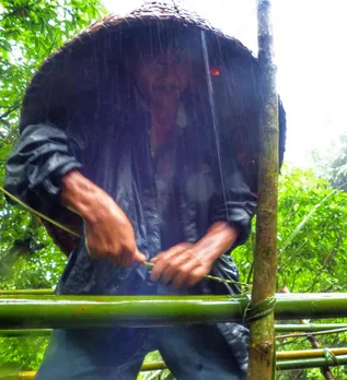 Repairing a living root bridge using natural materials. Pic: Living Bridges Foundation 30stades