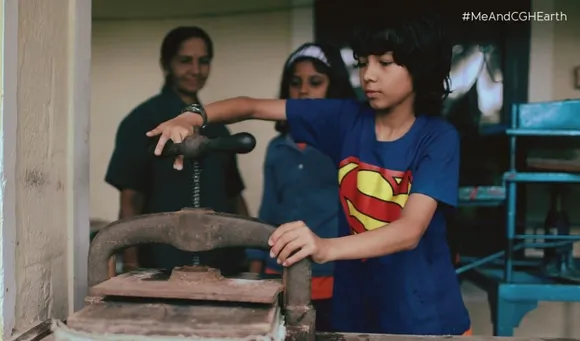 Guests making paper at the local recycled paper-making facility. Pic: Spice Village 30stades