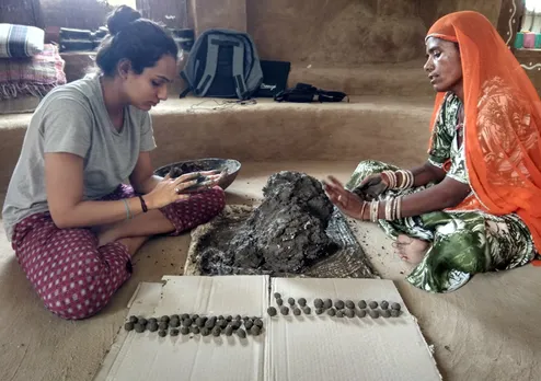 Preparing native seed balls. Pic: Maruvan 30stades