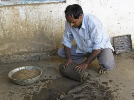 Dinesh Chandra Kumhar kneading and preparing the clay. Pic: Facebook/@DineshMolela 30stades