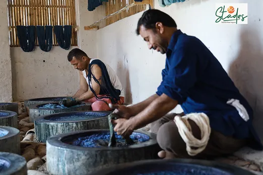 Shamji Valji with his brother working using the indigo dye.  Pic: Shamji Valji  30 stades