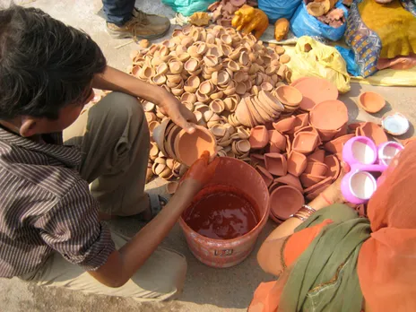 Geru, a natural earthen colour, is often used to colour and brighten the diyas.