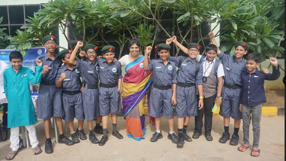 Rainwater Project founder Kalpana Ramesh with school students to create awareness about water conservation. Pic: Rainwater Project 30stades