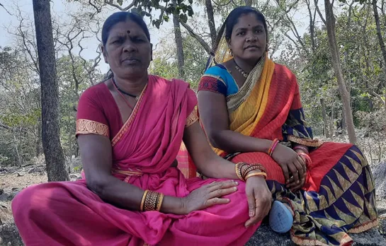 Dwarka Bai Uyke (left) and Punita Bai Uyke say they now earn enough to educate their children and feed their families. Pic: PRADAN