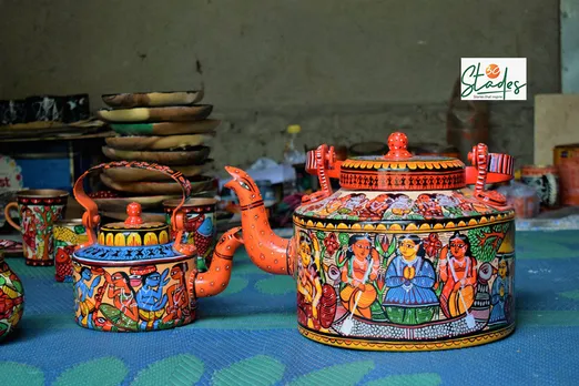 Patachitra painted kettles and glass depicting tales from Hindu mythology. Pic: Partho Burman