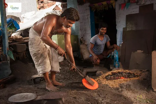 An artisan beating hot iron to make cast iron utensil. Pic: courtesy Zishta 30stades