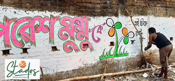Chandan Chanda working on a graffiti for Mamata Banerjee's Trinamool Congress. Pic: Partho Burman  30 stades