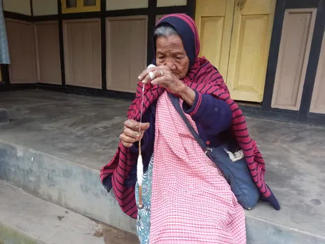 Hand spinning and weaving are time consuming processes. Here octogenarian Kong Loin Nongpoh is spinning yarn. Pic: Janessaline Pyngrope 30stades