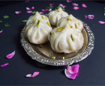 Maharashtra Cuisine Ukdiche Modak - made by stuffing coconut, jaggery, cardamom, nuts etc. into rice flour dough and then steamed. Pic: Flickr