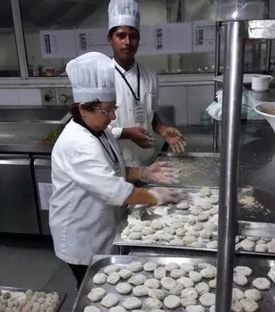 Hilla Marolia Chef Shezad in kitchen at Cafe Farohar, Udvada. Pic: courtesy Cafe Farohar