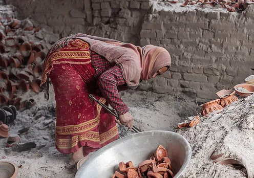 It cools down after about 12 hours when the diyas are removed.  