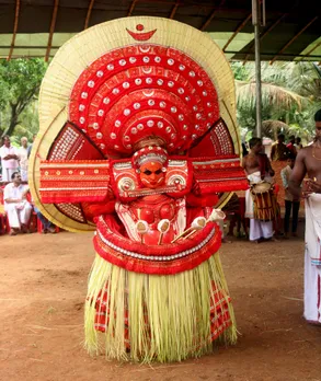 Theyyam artist wears an elaborate costume made out of splices of bamboo, and softwood planks, and covered with red and black cloth. Pic: Folkland Archives 30stades