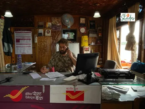 The staff is very busy on most days, and the work increases during tourist season. Postmaster Farooq Ahmad at work. Pic: Parsa Mahjoob 30stades