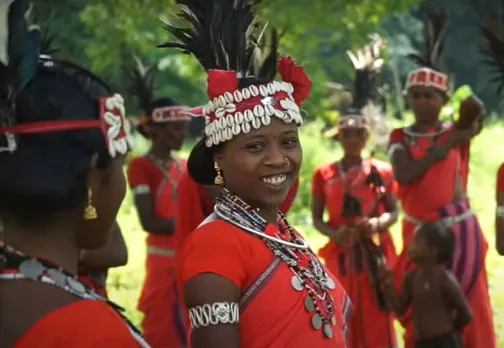 Women also wear headgear decorated with cowrie shells and jungle fowl or peacock feathers. Pic: Flickr 30stades