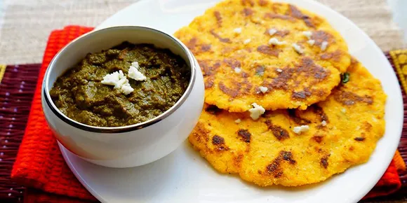 Sarson ka saag and makki ki roti is another Lohri dish though it is eaten throughout winters. Pic: Flickr 