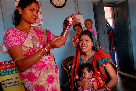 A community health worker administering vaccine to a baby. The immunisation programme ensures that children get all the life-saving vaccines on time. Source:  Pippa Ranger/DFID through Flickr