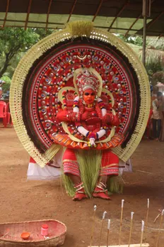 An artiste performing Chamundi Theyyam. Pic: Folkland Archives 30stades