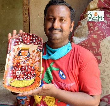 Chandan Chitrakar with a Patachitra tray. Pic: Partho Burman