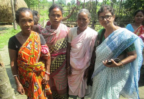 Chandra (extreme right) with women at Banebhasapara in Jalpaiguri District on her mission of collecting folk songs. Pic: Chandra Mukhopadhyay 30stades