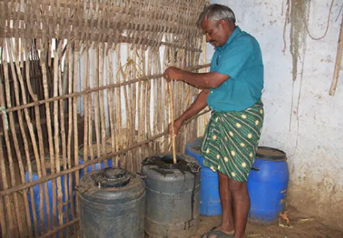 John Joseph inspecting his biofertilisers and pesticides. Pic: Anisha 30stades