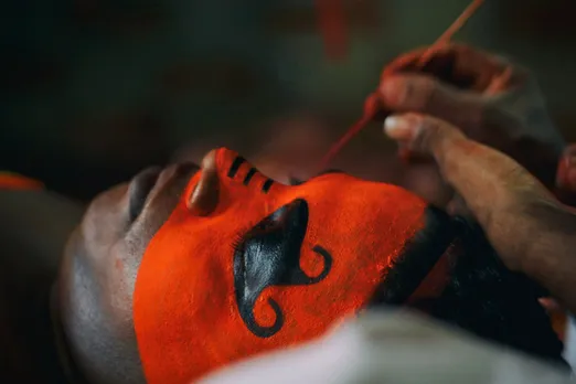 An artiste getting ready for Kandanar Kelan Theyyam. Pic: Folkland Archives 30stades