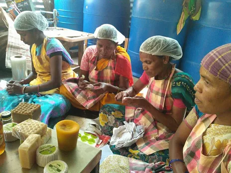 Tribal women making products from beeswax at an Aadhimalai processing centre in the Nilgiris. Pic:  AAPCL  30stades