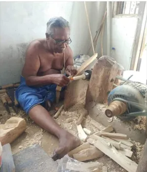 Award-winning Etikoppaka artist  PRV Sathya Narayana working on lathe machine at his workshop in Etikoppaka village.30 stades