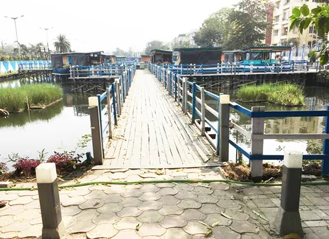 KMDA floating market project involved creation of bridges and pathways to navigate the boat stores besides a system to avoid water stagnation. 